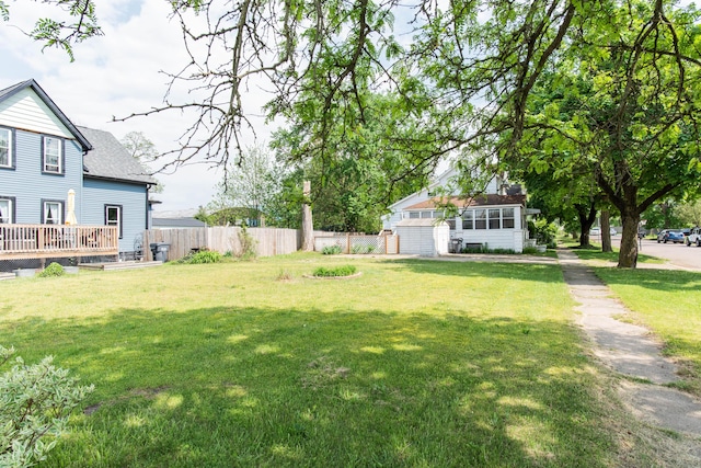 view of yard with a deck