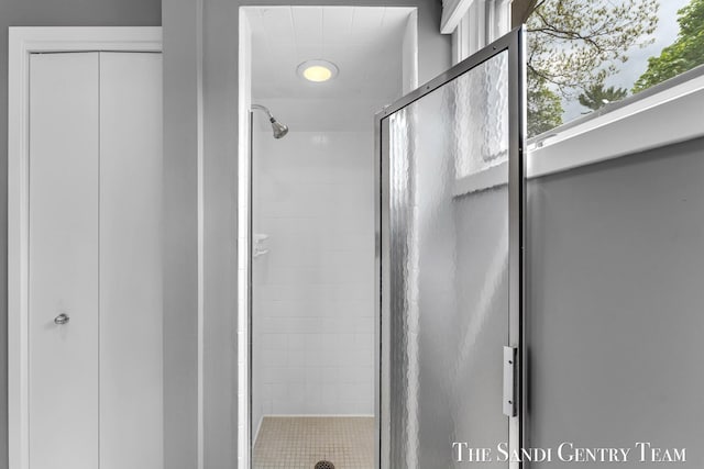 bathroom with a shower stall