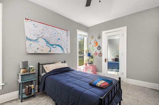 622 Thomas St SE, Grand Rapids, MI 49503 - carpeted bedroom featuring baseboards and a ceiling fan