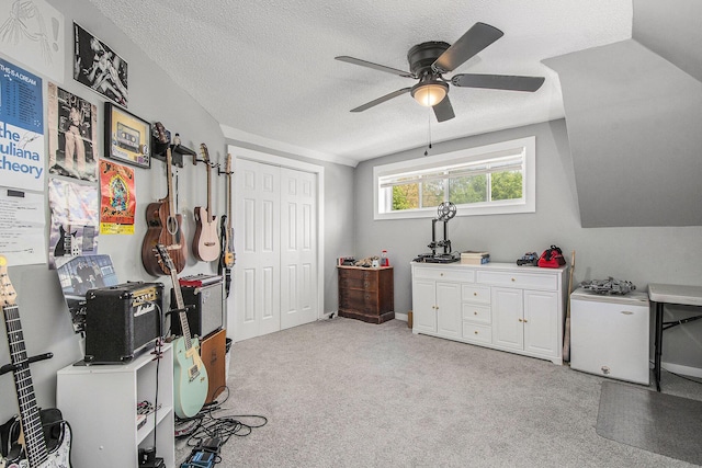 622 Thomas St SE, Grand Rapids, MI 49503 - game room with ceiling fan, a textured ceiling, and light colored carpet
