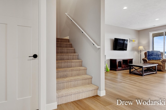 4688 20 Mile Rd, Kent City, MI 49330 - stairs featuring wood finished floors, recessed lighting, and baseboards