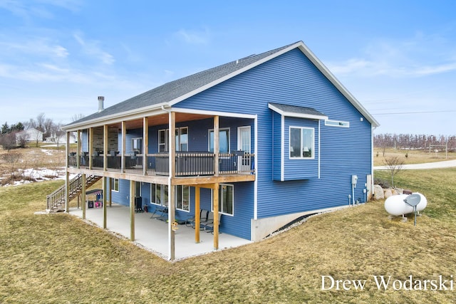 4688 20 Mile Rd, Kent City, MI 49330 - back of property featuring a patio, a lawn, stairs, and a shingled roof