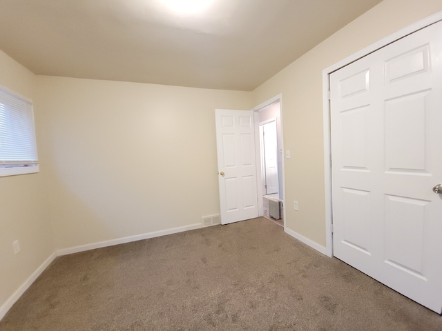 18453 Woodbine St, Detroit, MI 48219 - unfurnished bedroom featuring carpet floors and baseboards
