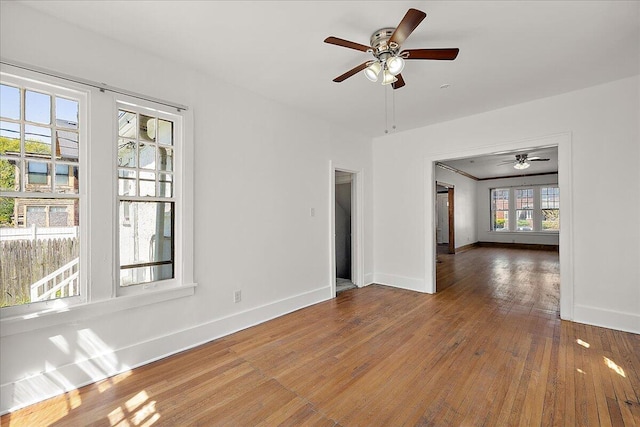 1199 Atkinson St, Detroit, MI 48202 - unfurnished room featuring a ceiling fan, baseboards, and wood-type flooring