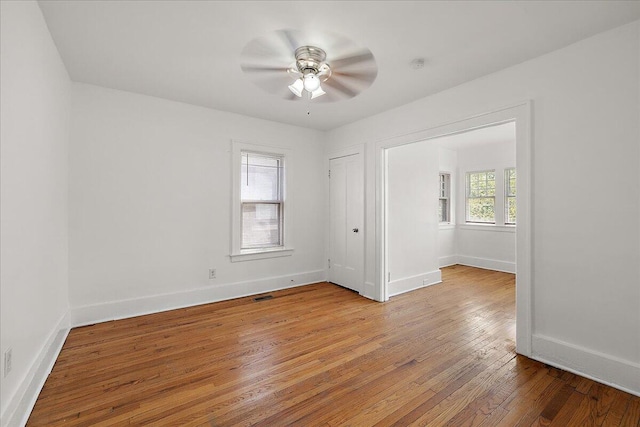 1199 Atkinson St, Detroit, MI 48202 - unfurnished room with light wood-style floors, baseboards, and a ceiling fan