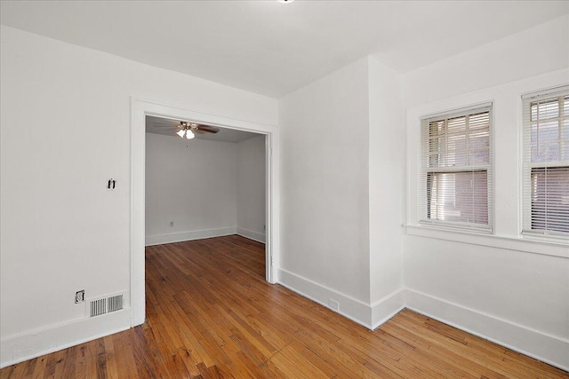 1199 Atkinson St, Detroit, MI 48202 - unfurnished room with wood-type flooring, baseboards, and ceiling fan