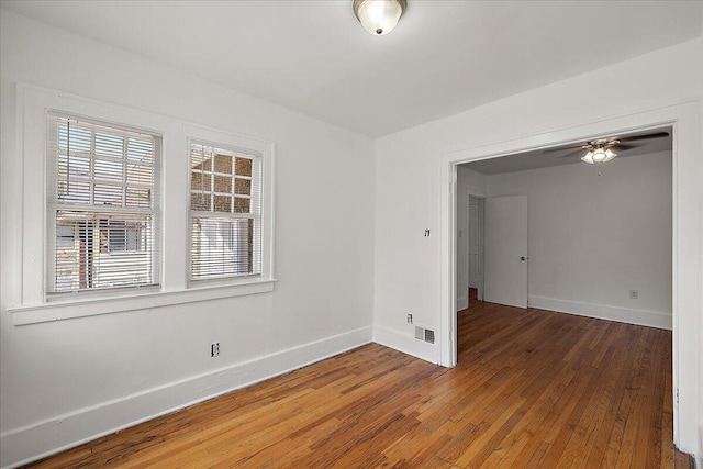 1199 Atkinson St, Detroit, MI 48202 - unfurnished room featuring wood-type flooring, baseboards, and a ceiling fan