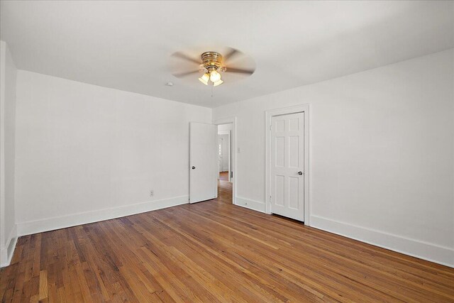 1199 Atkinson St, Detroit, MI 48202 - spare room with a ceiling fan, baseboards, and wood finished floors