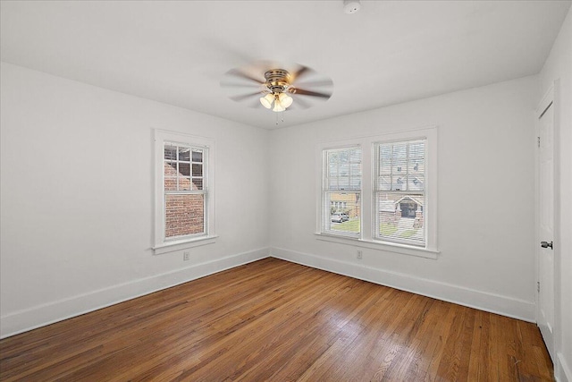 1199 Atkinson St, Detroit, MI 48202 - spare room featuring baseboards, a ceiling fan, wood finished floors, and a smoke detector