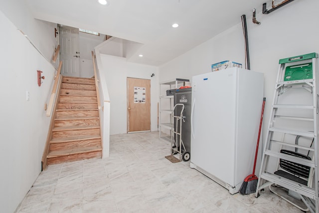 clothes washing area with recessed lighting