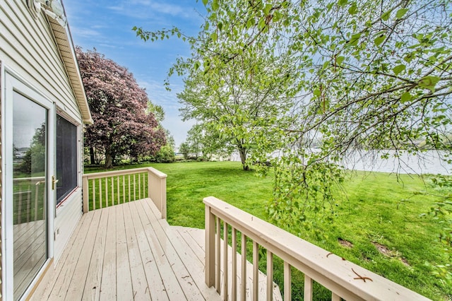 deck featuring a lawn