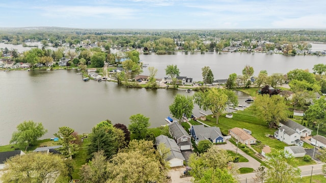 aerial view of residential area with a nearby body of water