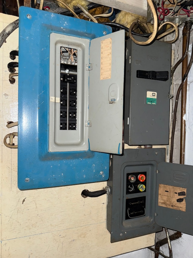utility room featuring electric panel