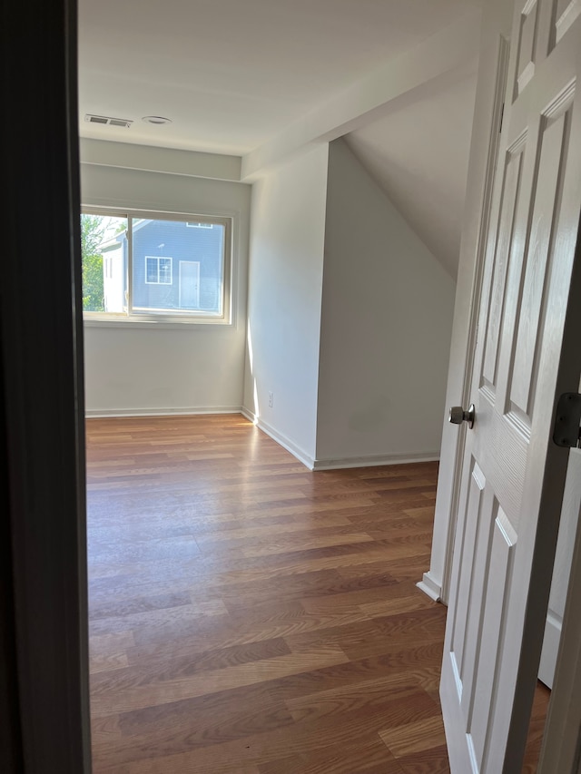 5606 Harold St, Hamtramck, MI 48212 - additional living space featuring wood finished floors, lofted ceiling, and baseboards