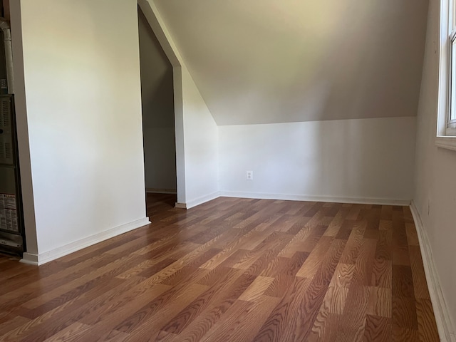 5606 Harold St, Hamtramck, MI 48212 - bonus room featuring vaulted ceiling, dark wood finished floors, and baseboards