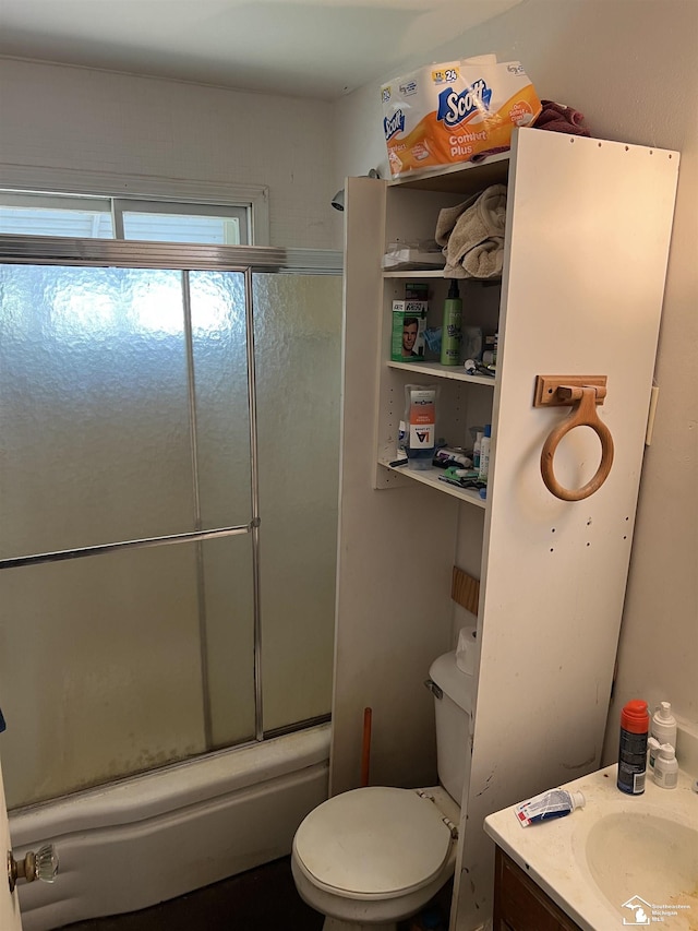 278 Oregon St, Ypsilanti, MI 48198 - full bath featuring toilet, shower / bath combination with glass door, and a sink
