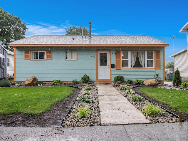 405 Jean St, Sturgis, MI 49091 - view of front of home with a front yard and a shingled roof