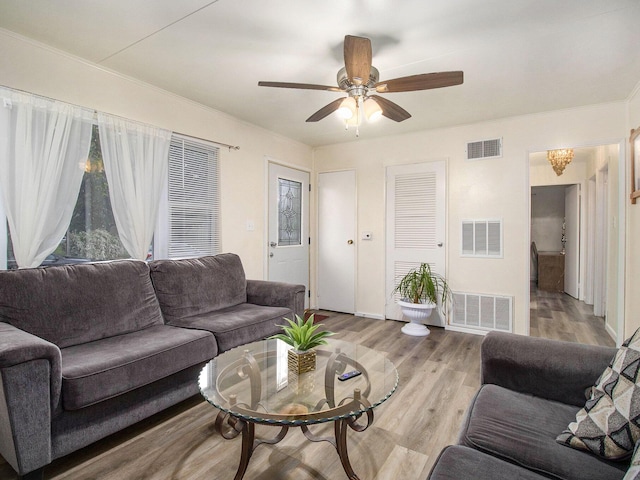405 Jean St, Sturgis, MI 49091 - living area with light wood-style floors, ceiling fan, and baseboards