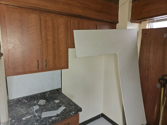 5297 Vancouver St, Detroit, MI 48204 - kitchen featuring brown cabinets and dark countertops