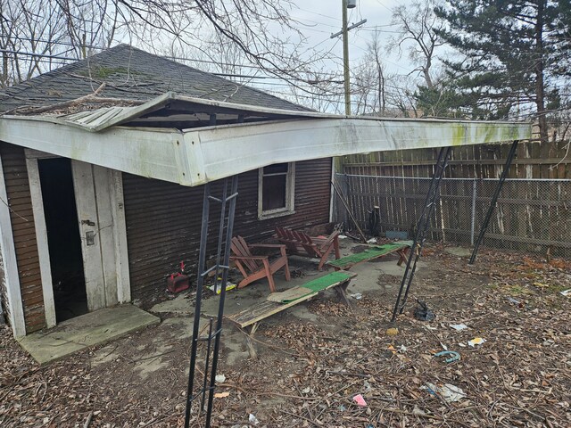 5297 Vancouver St, Detroit, MI 48204 - rear view of property with fence and a shingled roof