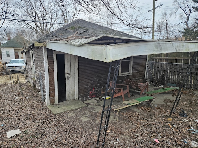 5297 Vancouver St, Detroit, MI 48204 - back of property featuring fence and a shingled roof