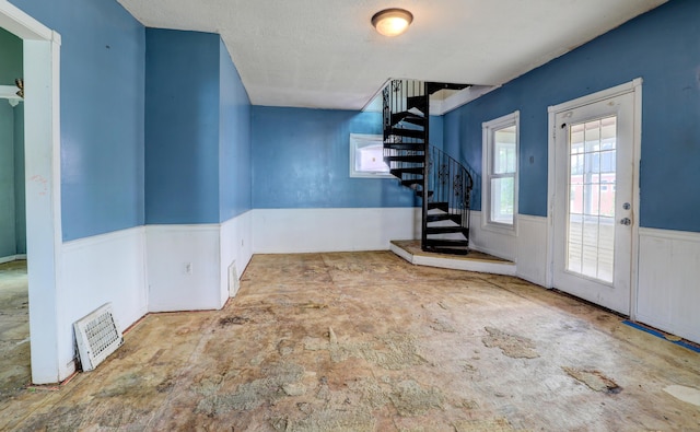 156 W 19th St, Holland, MI 49423 - foyer entrance with a wainscoted wall and stairway