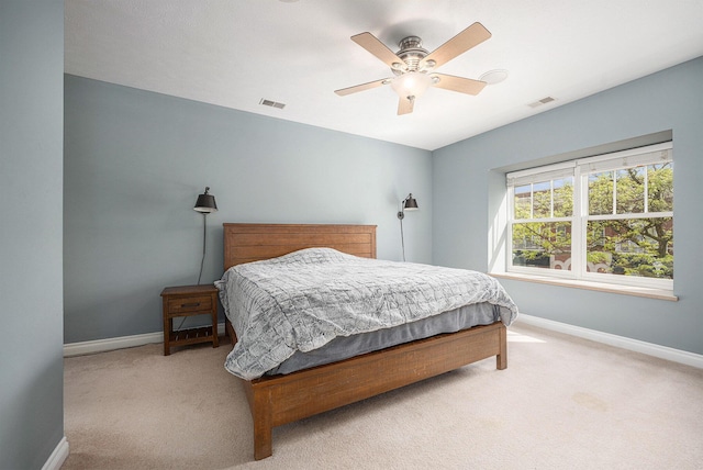 327 State St # 2, Saint Joseph, MI 49085 - bedroom with baseboards, carpet floors, and ceiling fan
