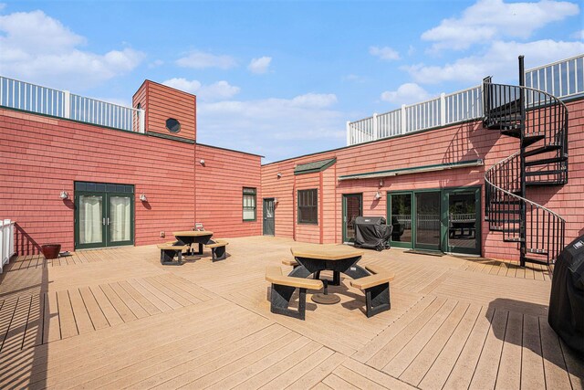 327 State St # 2, Saint Joseph, MI 49085 - wooden deck with stairs, outdoor dining space, french doors, and a grill