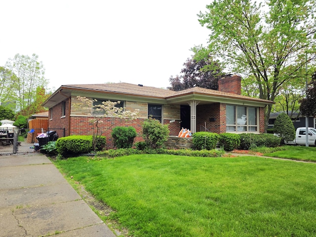 19266 Tyrone St, Harper Woods, MI 48225 - view of front facade with a chimney and brick siding