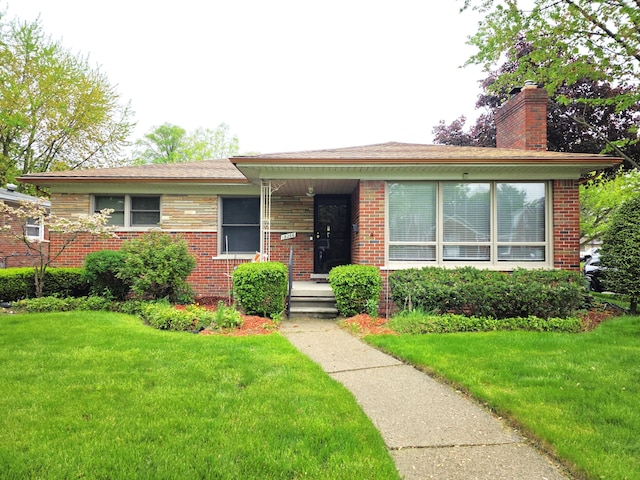 19266 Tyrone St, Harper Woods, MI 48225 - single story home featuring a chimney, a front yard, and brick siding