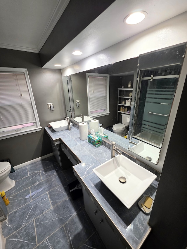 19266 Tyrone St, Harper Woods, MI 48225 - bathroom with toilet, crown molding, baseboards, a stall shower, and double vanity