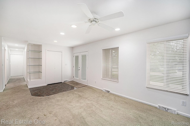 3079 Ravinewood Dr, Commerce Twp, MI 48382 - unfurnished bedroom featuring carpet floors, recessed lighting, baseboards, and a ceiling fan