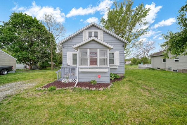 5732 Selfridge Blvd, Lansing, MI 48911 - view of front of home featuring a front lawn