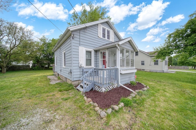 5732 Selfridge Blvd, Lansing, MI 48911 - view of front facade with a sunroom