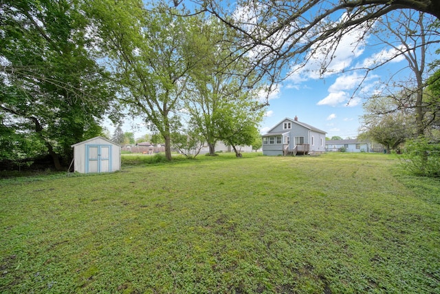 5732 Selfridge Blvd, Lansing, MI 48911 - view of green lawn featuring a storage unit and an outdoor structure