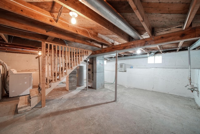 5732 Selfridge Blvd, Lansing, MI 48911 - below grade area with washer / dryer, stairway, water heater, and heating unit