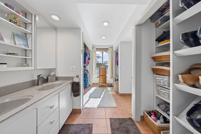 9417 Cedar Island Rd, White Lake, MI 48386 - full bathroom featuring tile patterned floors, double vanity, and recessed lighting
