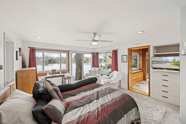 9417 Cedar Island Rd, White Lake, MI 48386 - bedroom with light carpet, recessed lighting, and ceiling fan