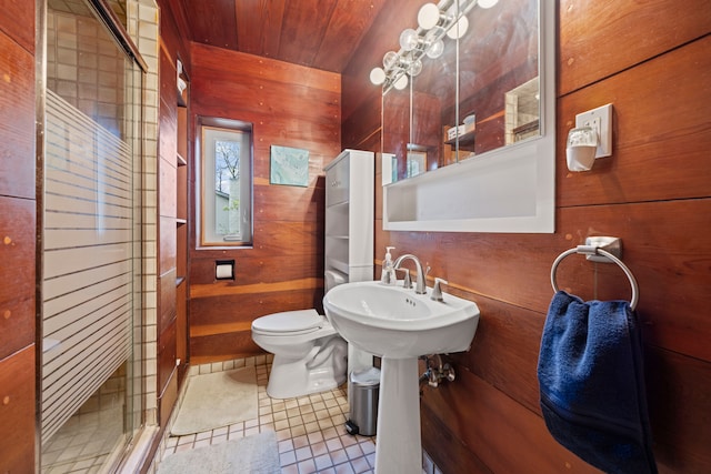 9417 Cedar Island Rd, White Lake, MI 48386 - full bath featuring wood walls, wood ceiling, a stall shower, tile patterned flooring, and toilet