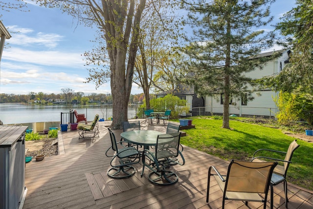 9417 Cedar Island Rd, White Lake, MI 48386 - deck featuring a water view and outdoor dining space
