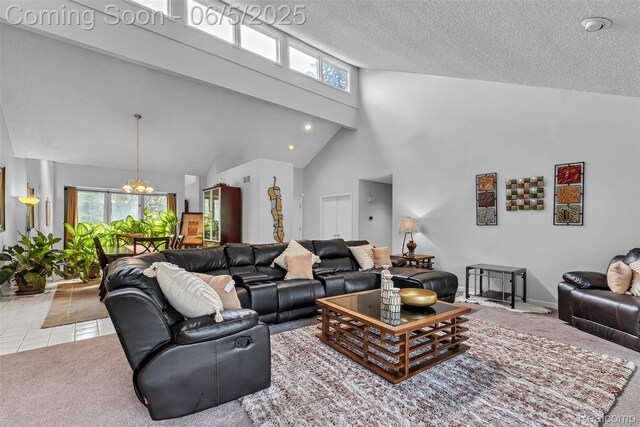 5520 Ridgewood, West Bloomfield, MI 48322 - living room featuring carpet floors, high vaulted ceiling, plenty of natural light, a textured ceiling, and a chandelier