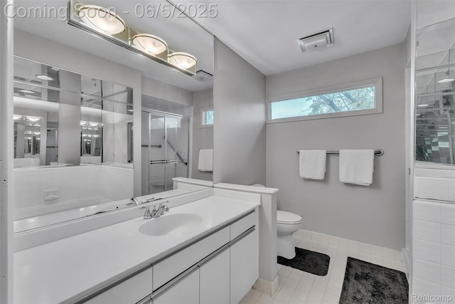 5520 Ridgewood, West Bloomfield, MI 48322 - full bath with a stall shower, vanity, toilet, and tile patterned floors