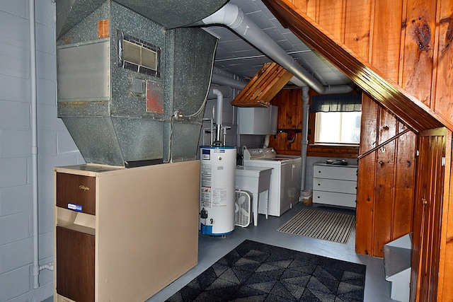 9609 E Madison Rd, Saint Helen, MI 48656 - laundry area with gas water heater