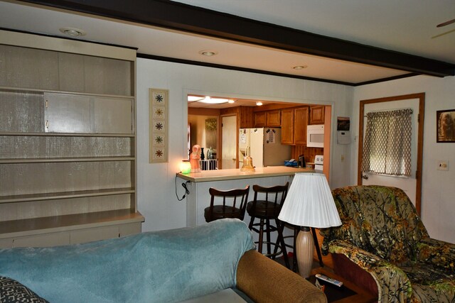 9609 E Madison Rd, Saint Helen, MI 48656 - living room featuring beamed ceiling and recessed lighting