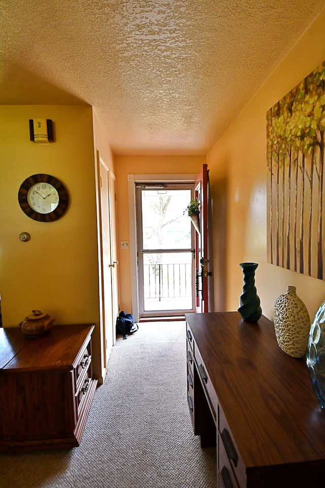 9609 E Madison Rd, Saint Helen, MI 48656 - hallway featuring carpet floors and a textured ceiling