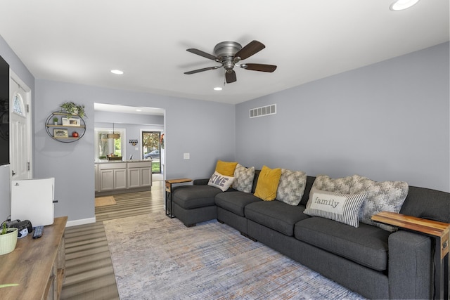 22171 Monterey Dr, Trenton, MI 48183 - living area featuring wood finished floors, recessed lighting, and ceiling fan