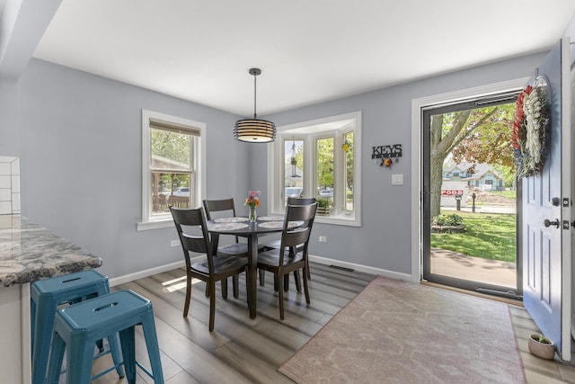 22171 Monterey Dr, Trenton, MI 48183 - dining space with wood finished floors and baseboards