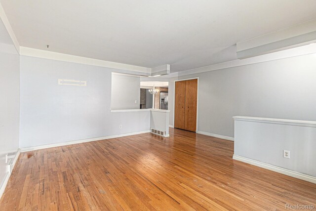 11414 Nancy Dr, Warren, MI 48093 - spare room with light wood-style floors and baseboards