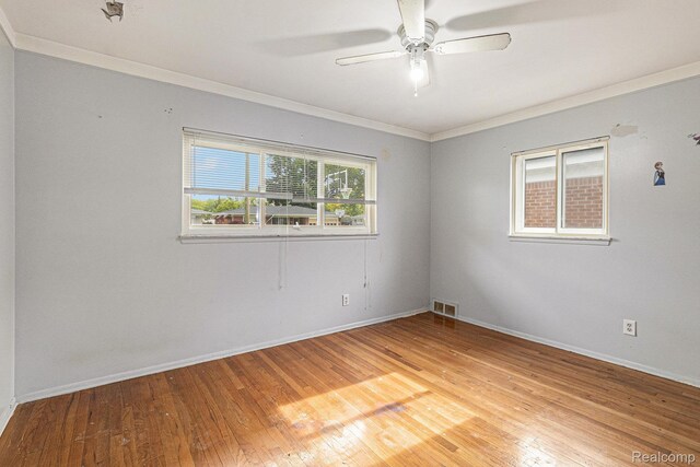 11414 Nancy Dr, Warren, MI 48093 - unfurnished room with ornamental molding, light wood-type flooring, baseboards, and ceiling fan