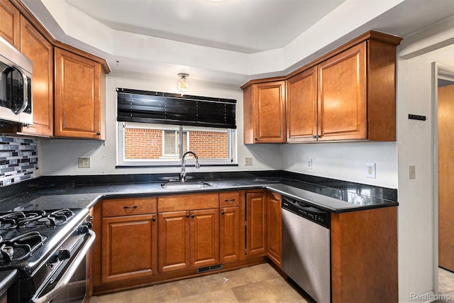 11414 Nancy Dr, Warren, MI 48093 - kitchen featuring appliances with stainless steel finishes, a sink, and brown cabinets